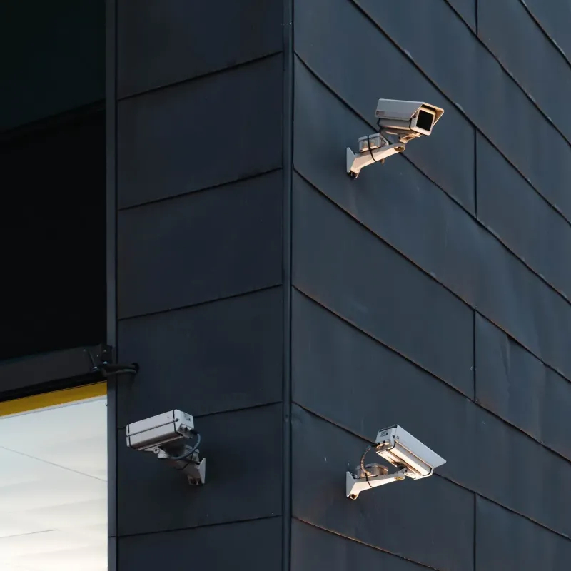 surveillance camera attached to a commercial building