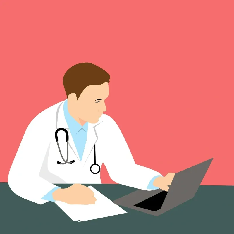 cartoon drawing of doctor looking at laptop