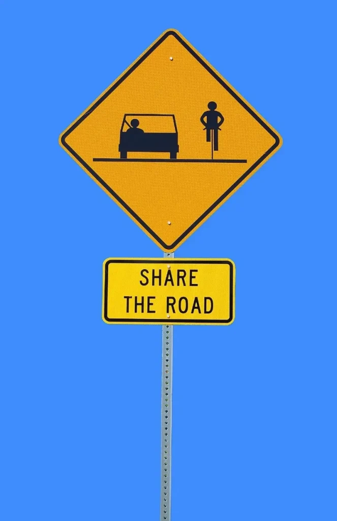 share the road sign