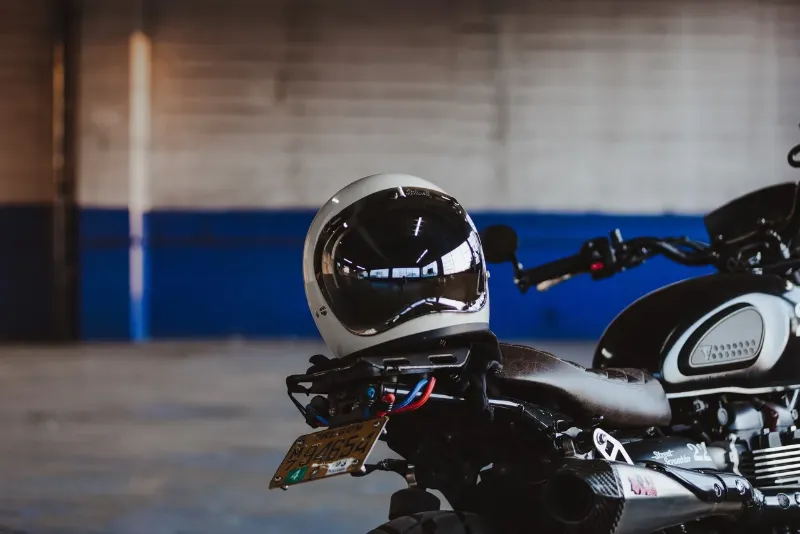 motorcycle helmet sitting on a motorcycle seat