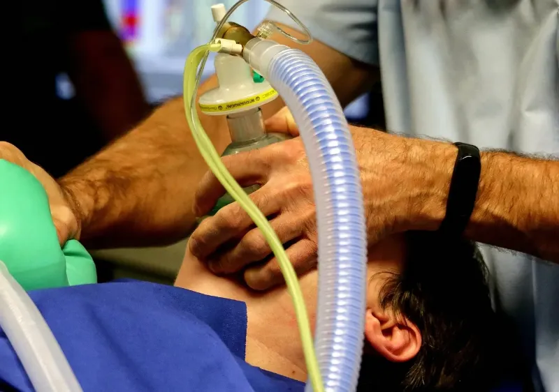 doctor putting patient under Anesthesia