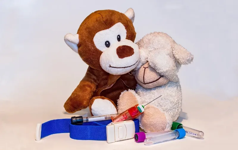 stuffed animals with tourniquet a needle and viles